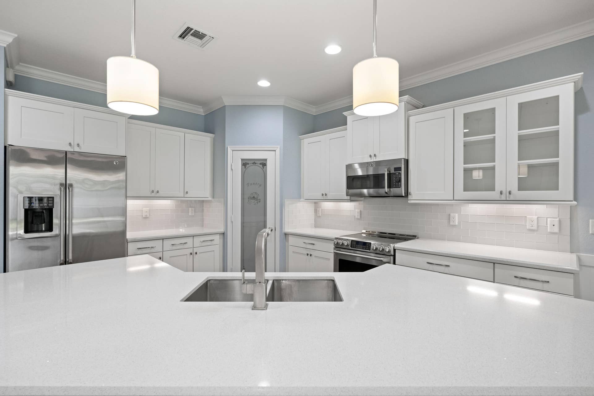 Pendant lights over center island