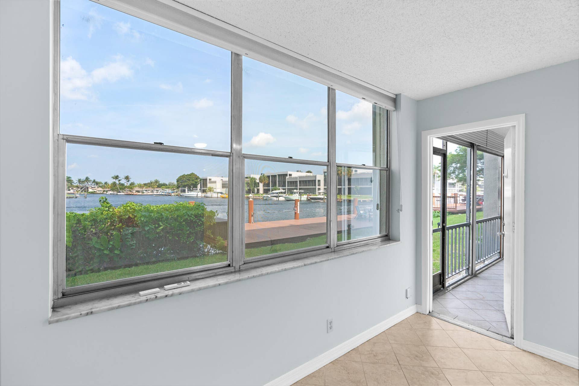 777 S FEDERAL Highway, #103G, Pompano Beach, FL 33062 Primary Bedroom - 2nd door leads to patio