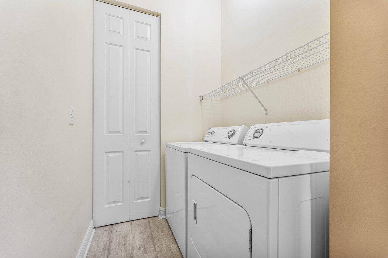 2611 VENETIAN Drive, Boynton Beach, FL 33426 2nd Floor Laundry with large storage closet
