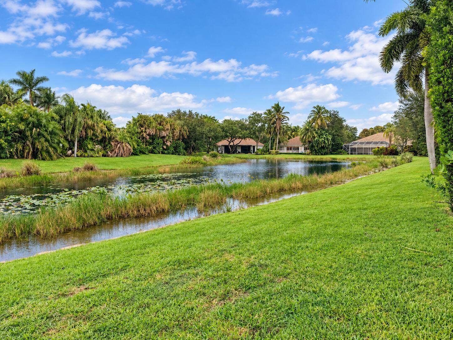 1705 FLAGLER MANOR Circle, West Palm Beach, FL 33411 Lakefront View from Backyard
