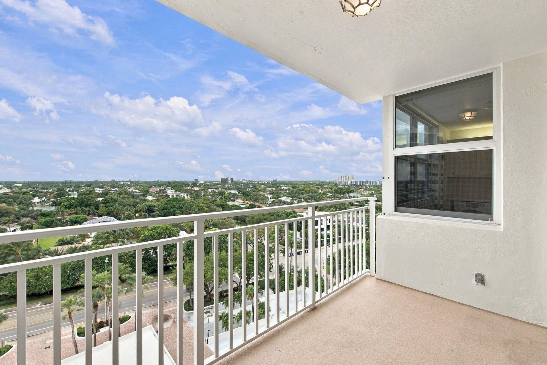 VIEW FROM OTHER SIDE OF BALCONY.
