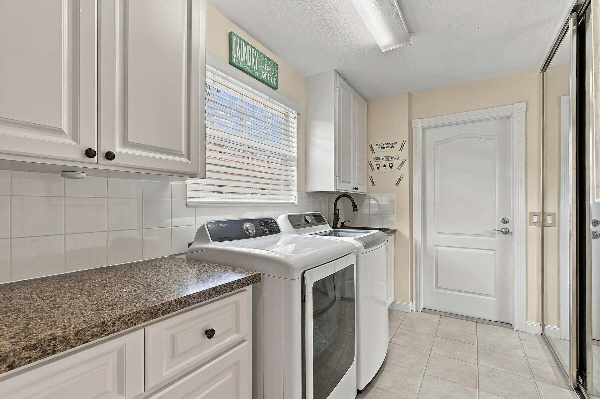 Laundry room with sink