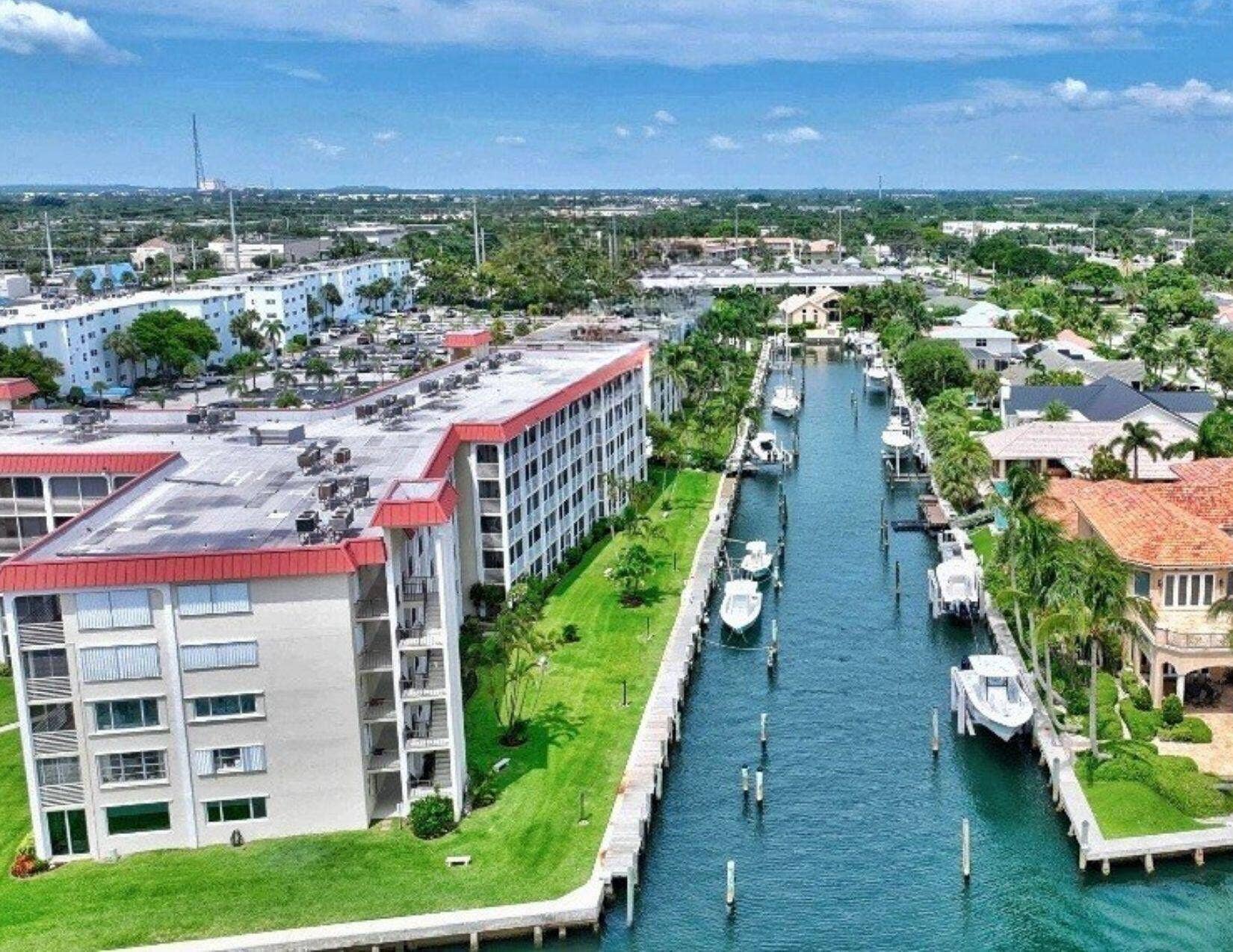 105 PARADISE HARBOUR Boulevard, #108, North Palm Beach, FL 33408 View of canal