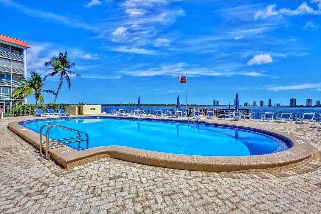 105 PARADISE HARBOUR Boulevard, #108, North Palm Beach, FL 33408 Heated pool year round