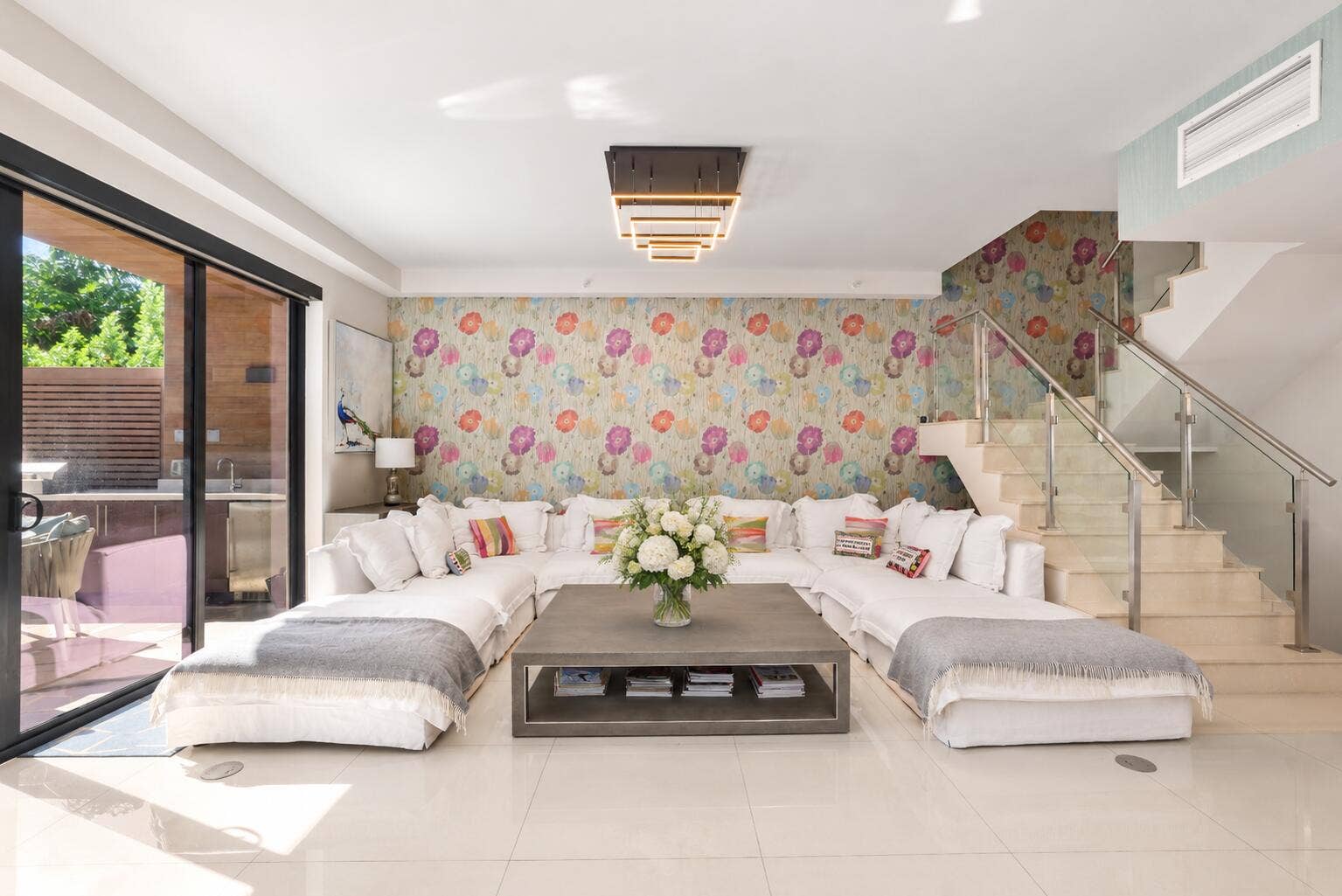 3030 N Ocean Boulevard, #S106, Fort Lauderdale, FL 33308 Floral Oasis in a Modern Living Room