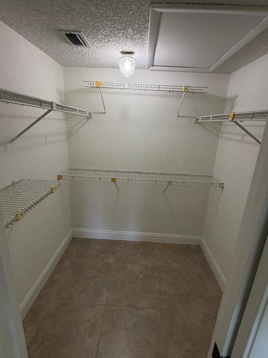 21943 REMSEN Terrace, #203, Boca Raton, FL 33433 Walking closet