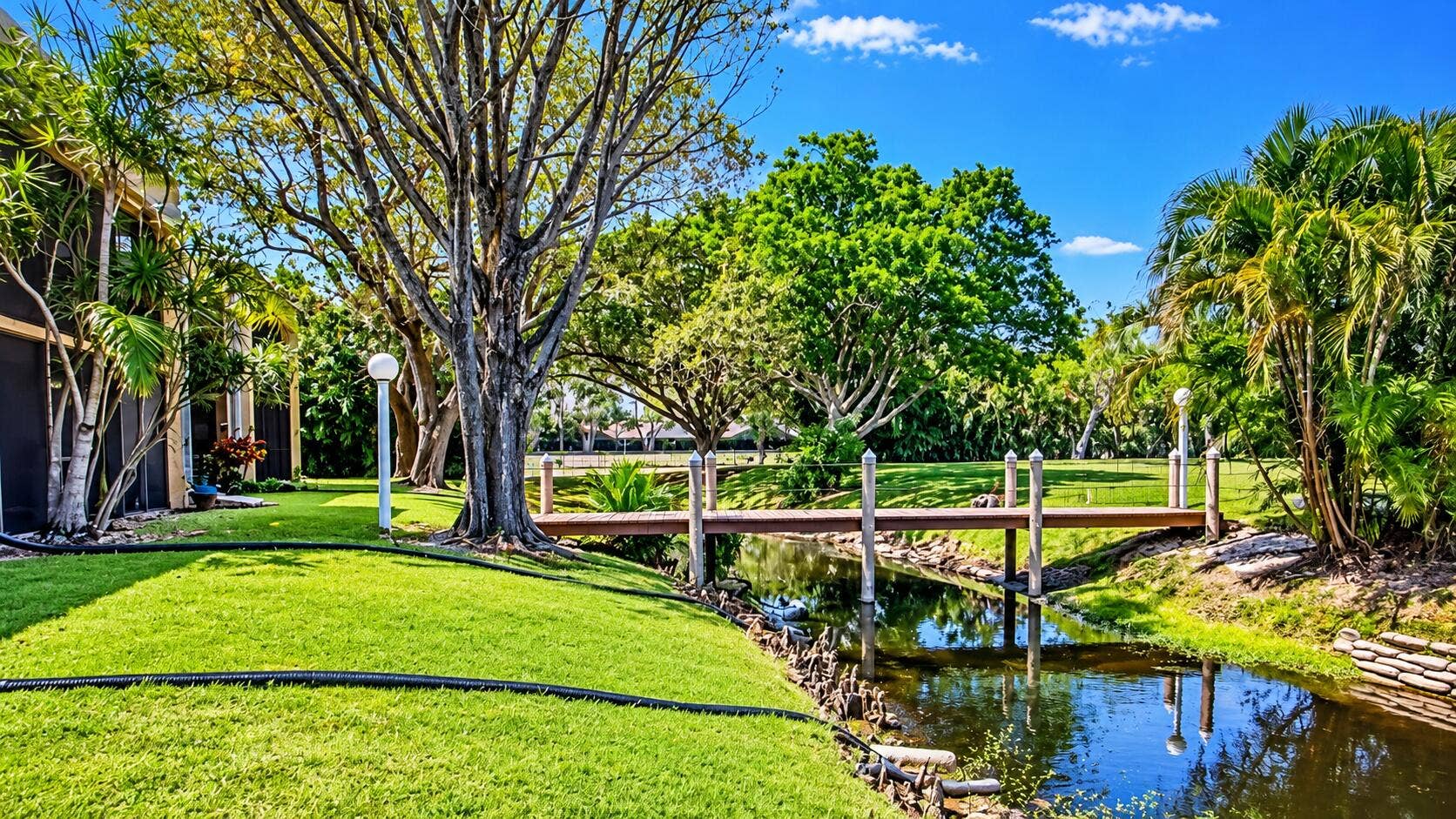 8701 SW 30TH Street, #205, Davie, FL 33328 Sunny Garden Bridge Reflections