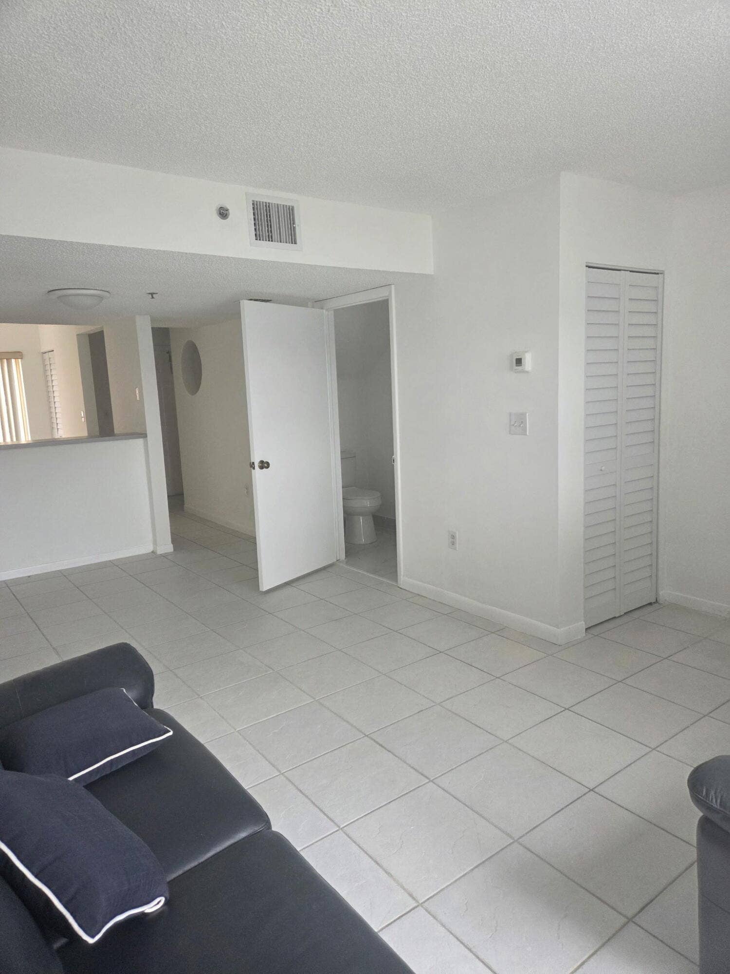 215 RIVIERA Circle, Weston, FL 33326 B - Living & Dining area with half bath