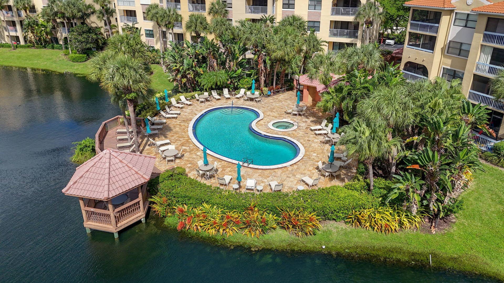 300 UNO LAGO Drive, #104, Juno Beach, FL 33408 Lagoon Pool