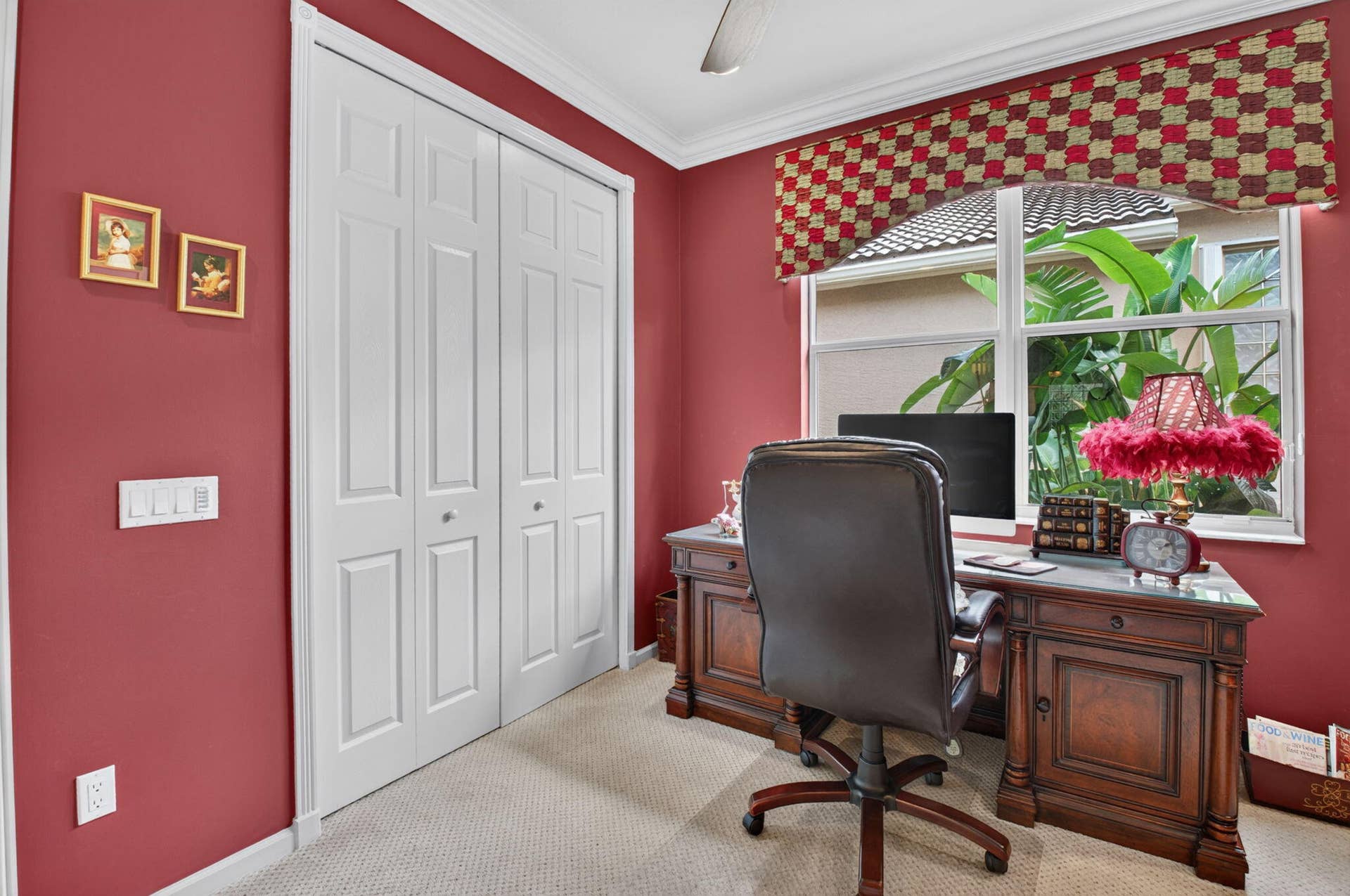 6874 Venidita Beach Drive, Delray Beach, FL 33446 Bifold closet doors with a six-panel design, neutral-toned carpeting, crown molding, and a single-hung window featuring white trim