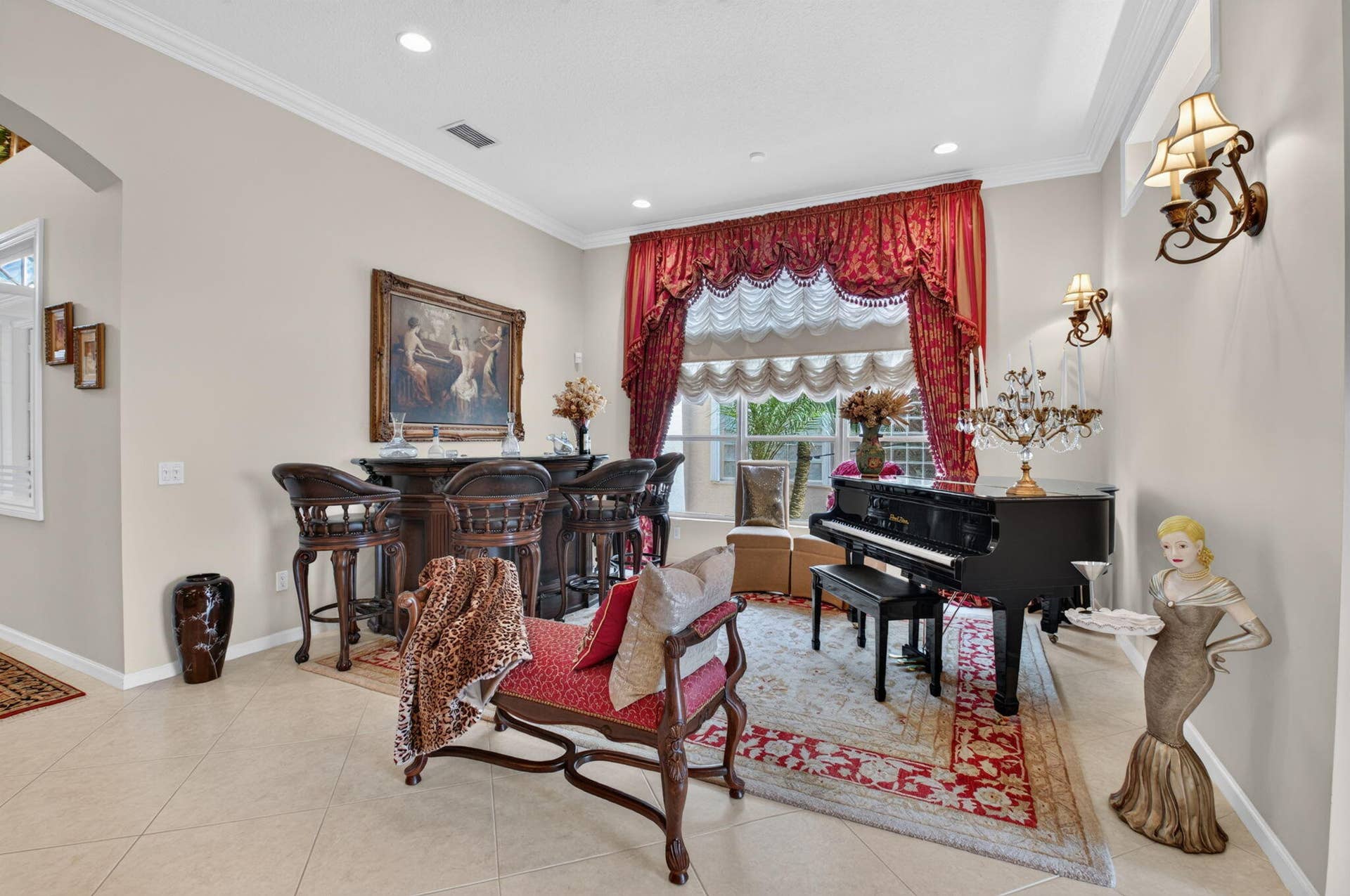 6874 Venidita Beach Drive, Delray Beach, FL 33446 Interior space featuring tile flooring, crown molding, recessed lighting, and wall-mounted metal sconces