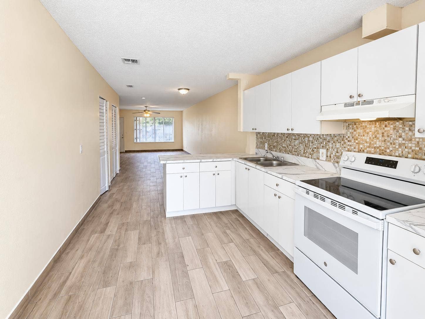 4859 ORLEANS Court, #B, West Palm Beach, FL 33415 KITCHEN AND LIVING ROOM