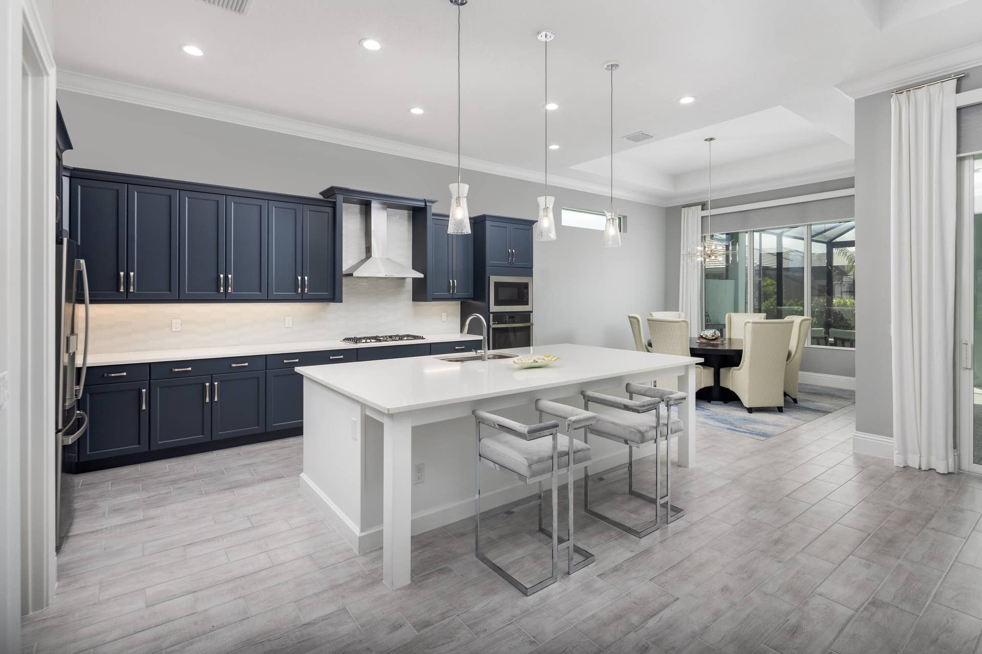 9155 SW PINNACLE Place, Port St Lucie, FL 34987 Kitchen with oversized quartz island