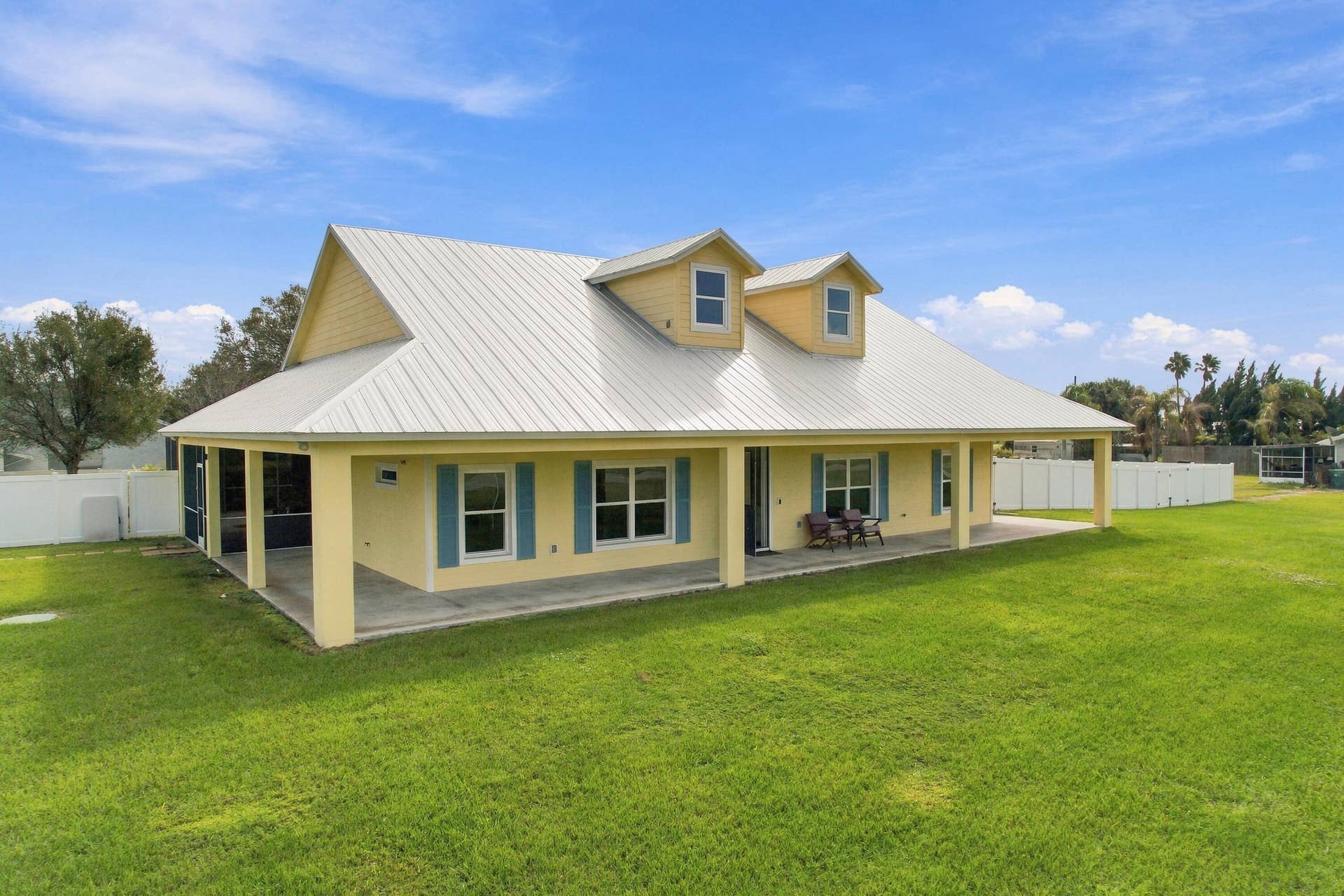 8700 SW 2nd Street, Okeechobee, FL 34974 Charming Wraparound Covered Porch
