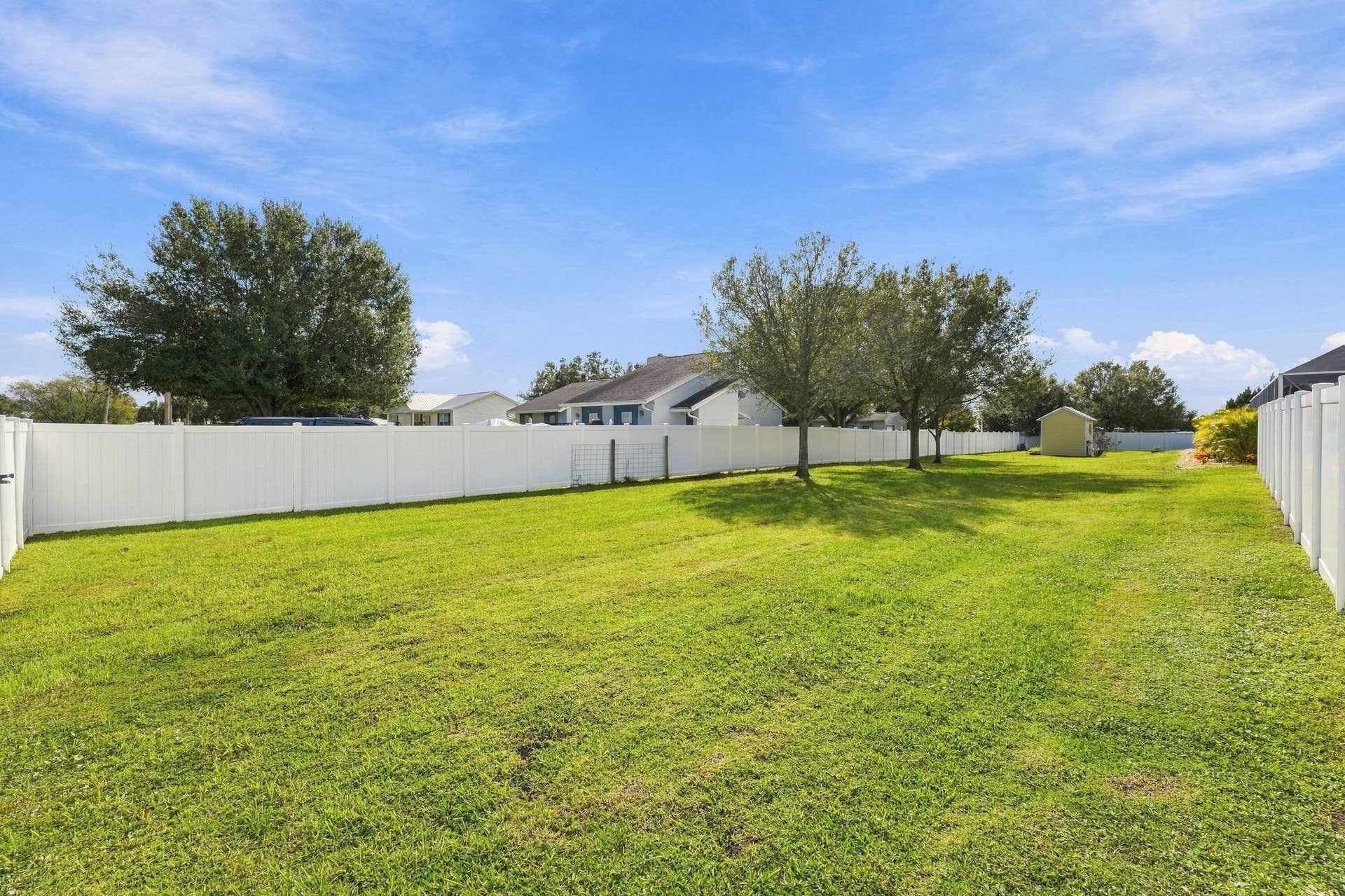 8700 SW 2nd Street, Okeechobee, FL 34974 Large Fenced Yard with Mature Trees