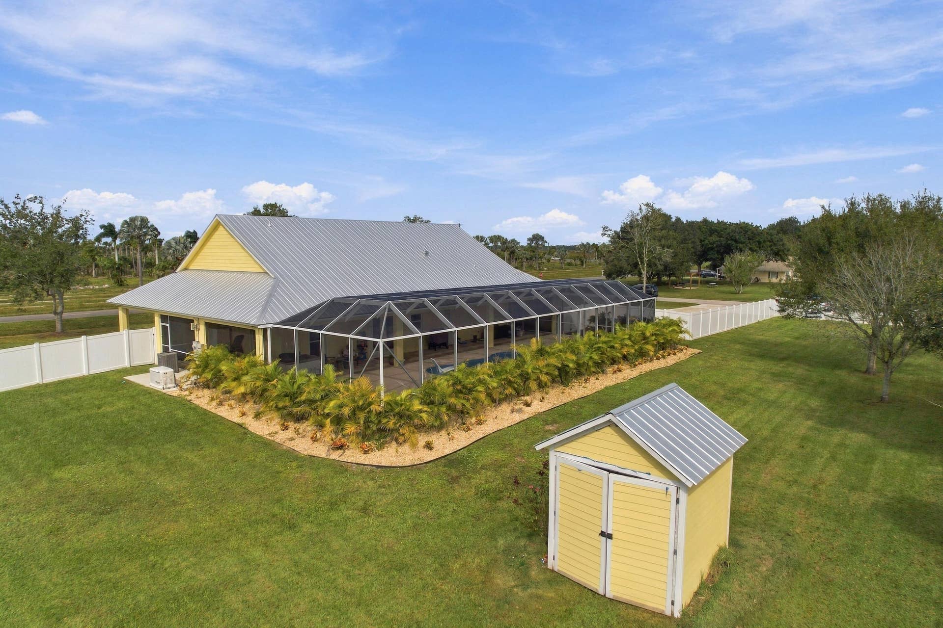 8700 SW 2nd Street, Okeechobee, FL 34974 Metal Roof, Screened Pool & Shed