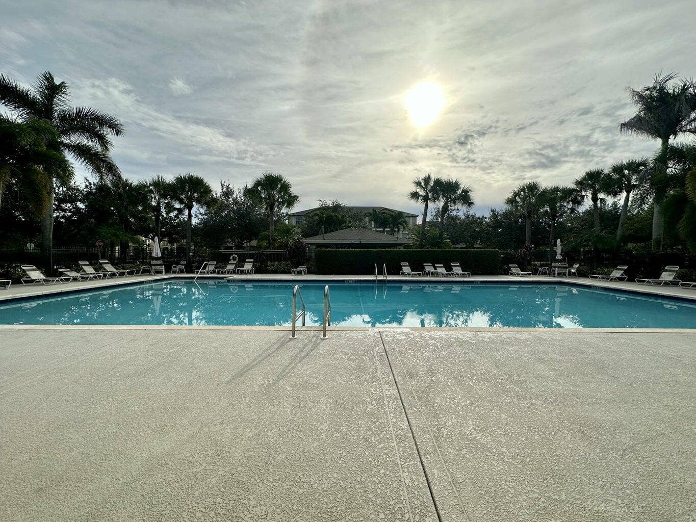 2143 SE BELL ISLE Drive, Port St Lucie, FL 34952 East lake pool