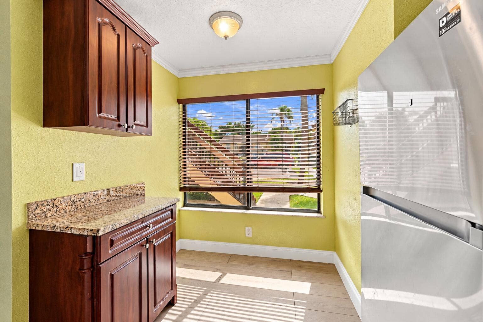 2572 RIVERSIDE Drive, #413, Coral Springs, FL 33065 Sunlit Clutter-Free Kitchen Nook