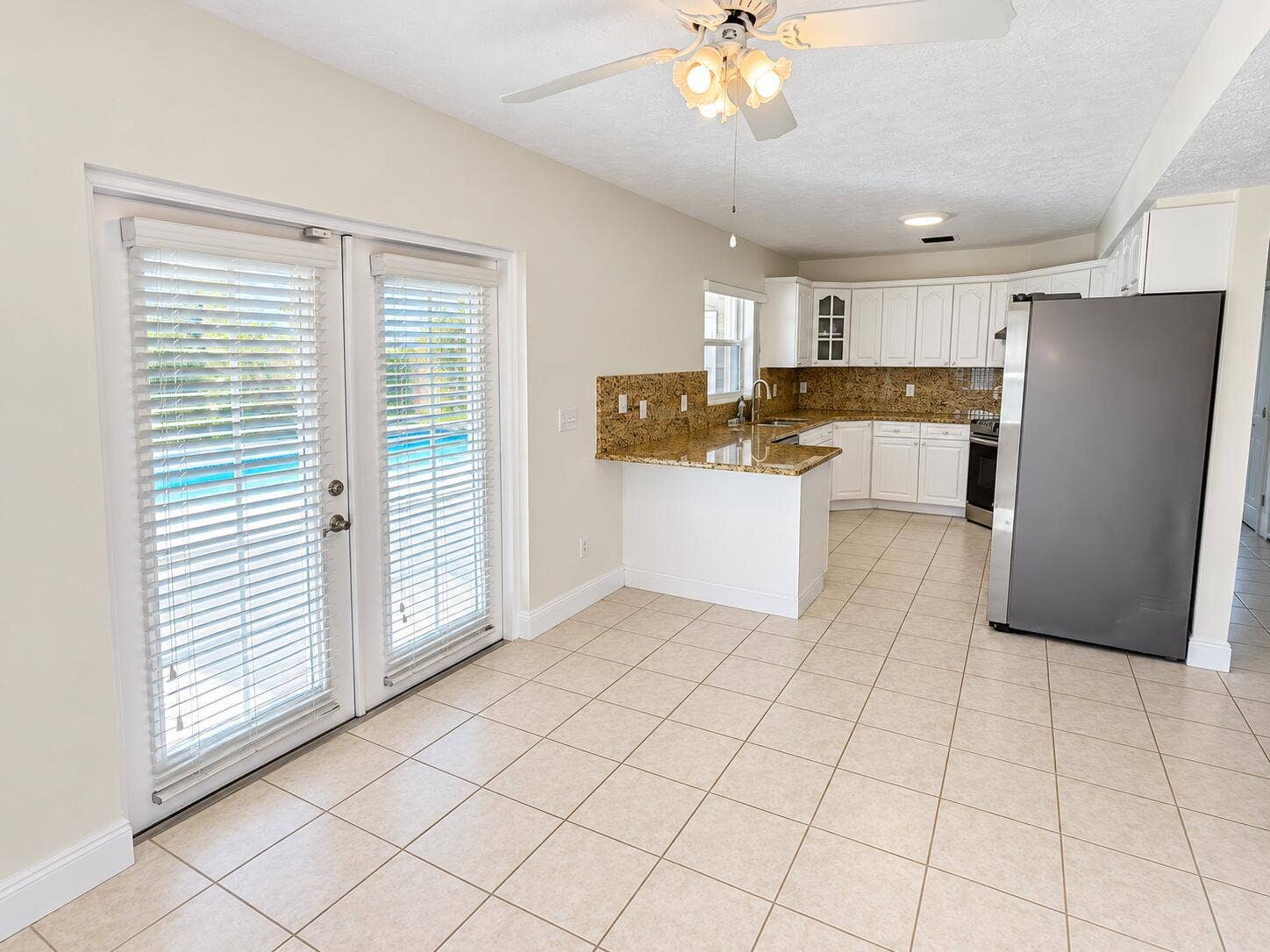 Bright Empty Kitchen and Dining Space