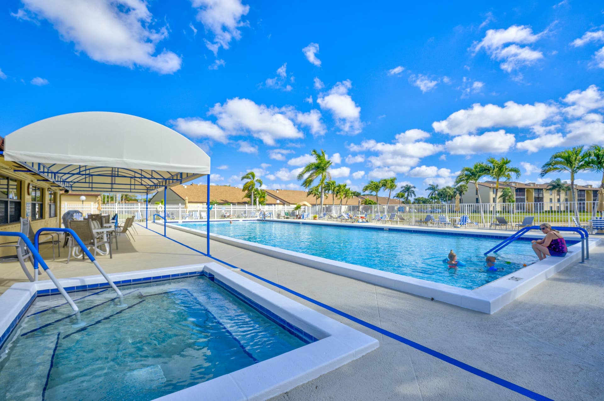 816 SKY PINE Way, #E, Greenacres, FL 33415 Cozy Community Pool