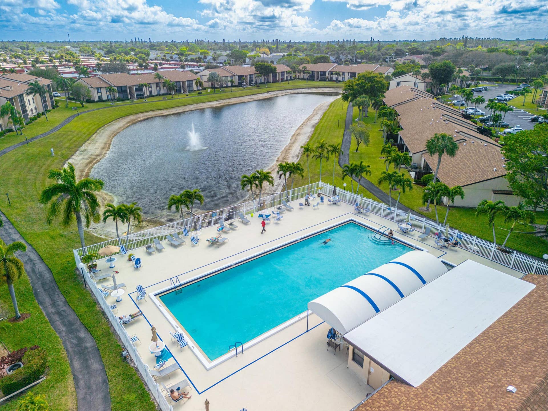 816 SKY PINE Way, #E, Greenacres, FL 33415 Large Pool on the lake