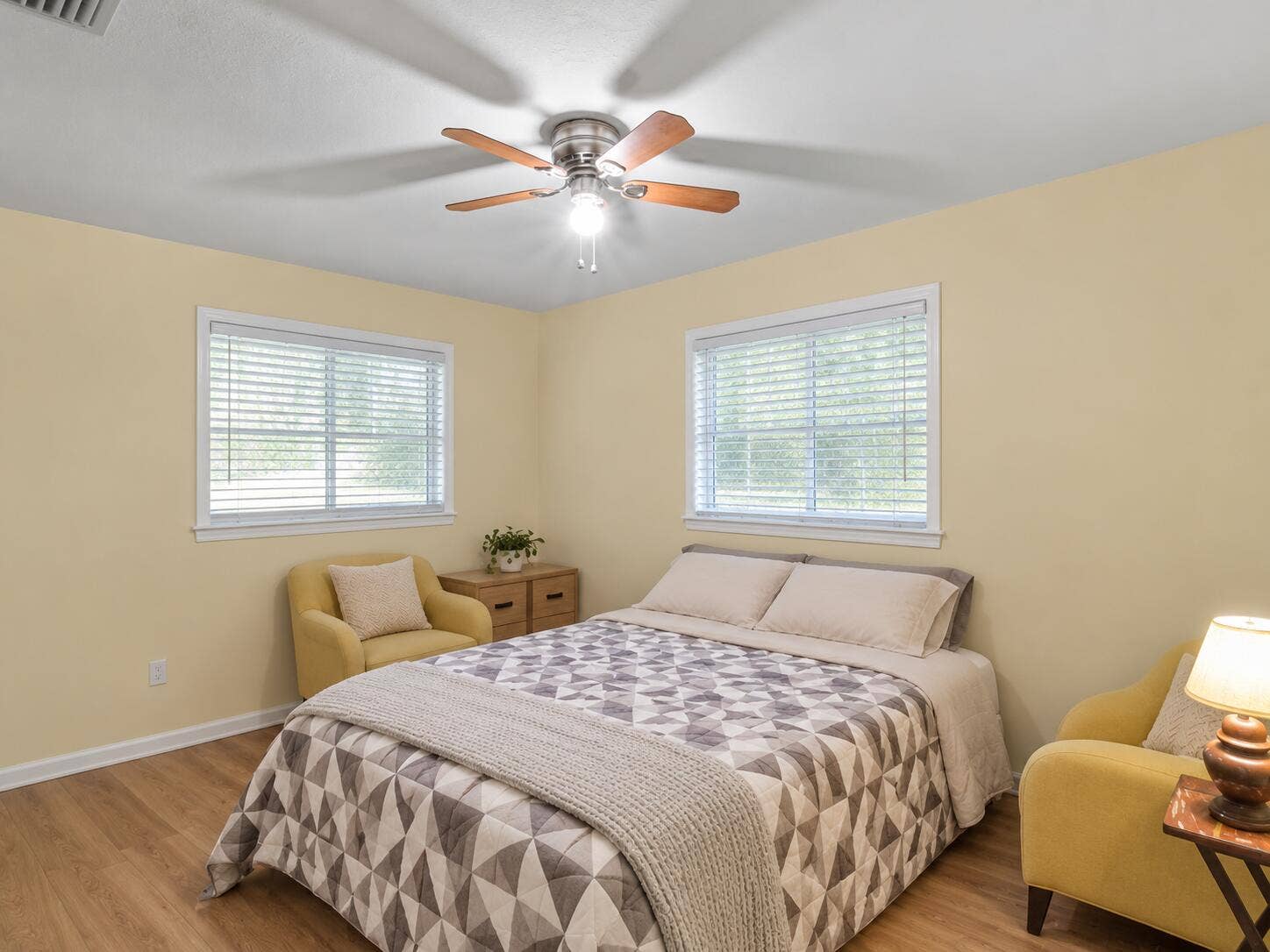 Decluttered bedroom with clean white bli