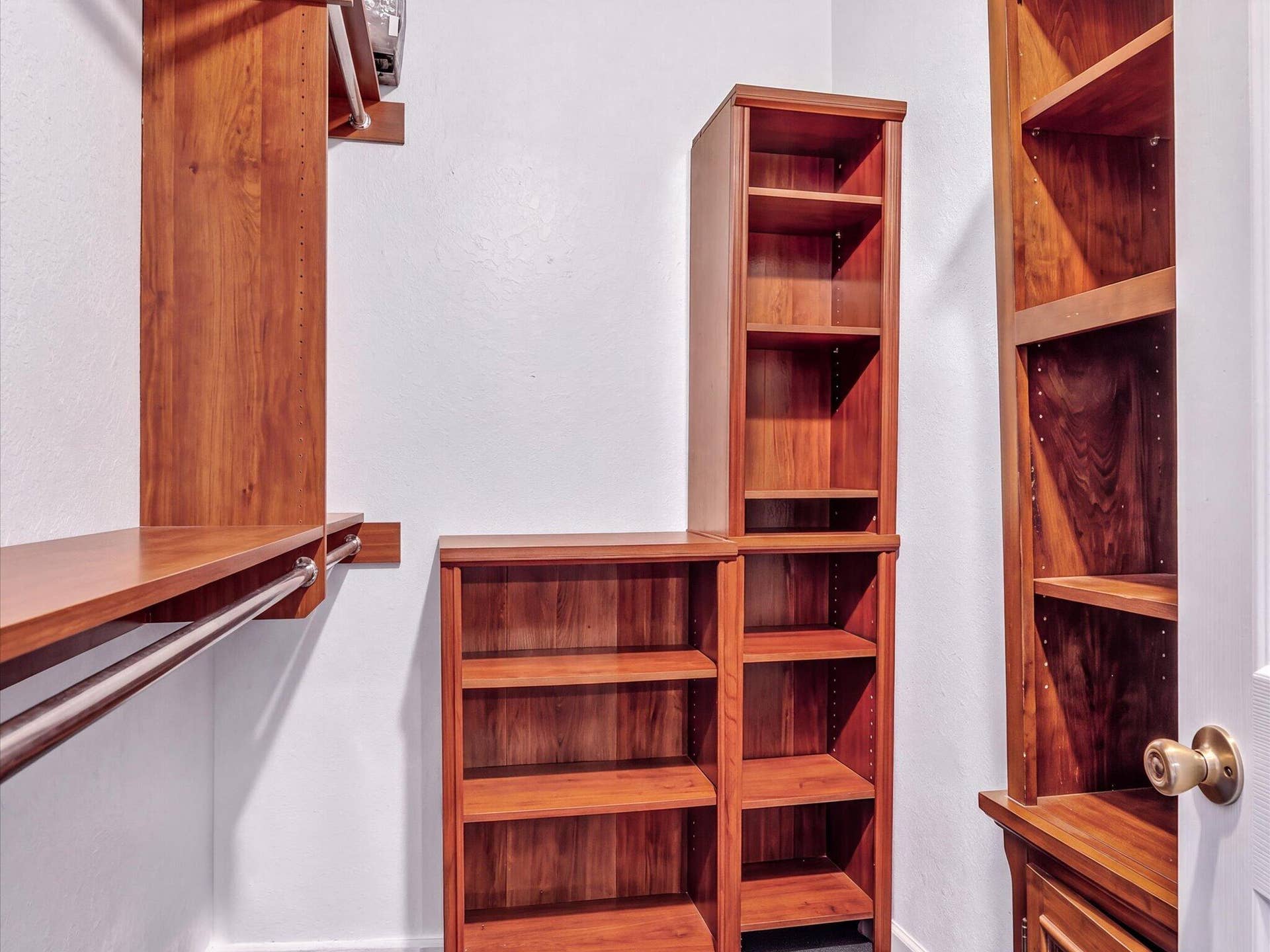 6450 W SAMPLE Road, #6450, Coral Springs, FL 33067 Primary Bedroom Walk-in Closet with Built-ins