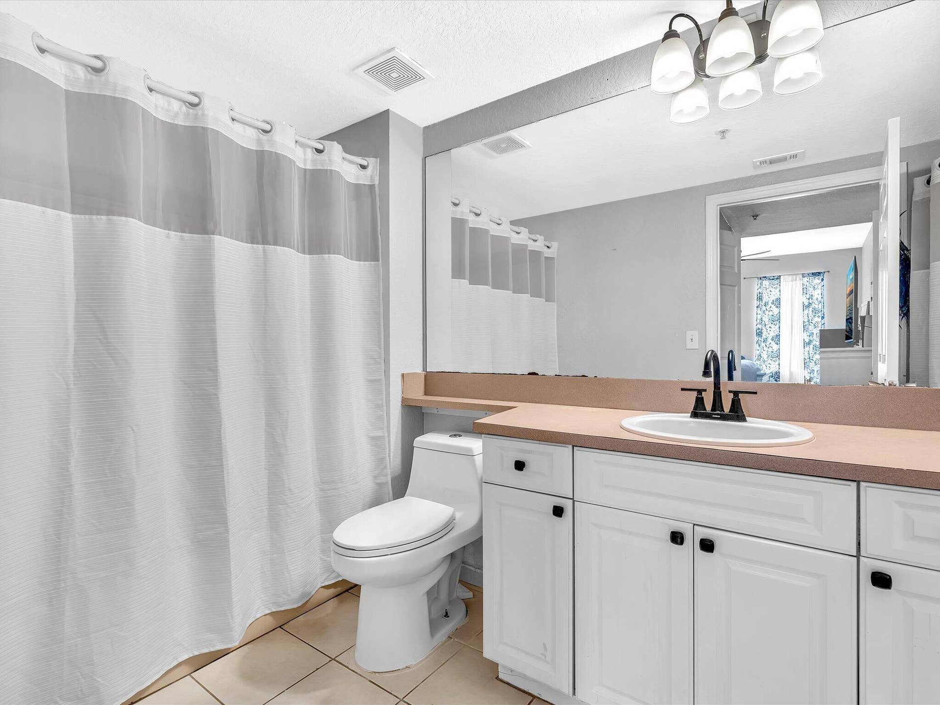 6450 W SAMPLE Road, #6450, Coral Springs, FL 33067 Primary Bathroom with tub on one side and shower in the opposite side