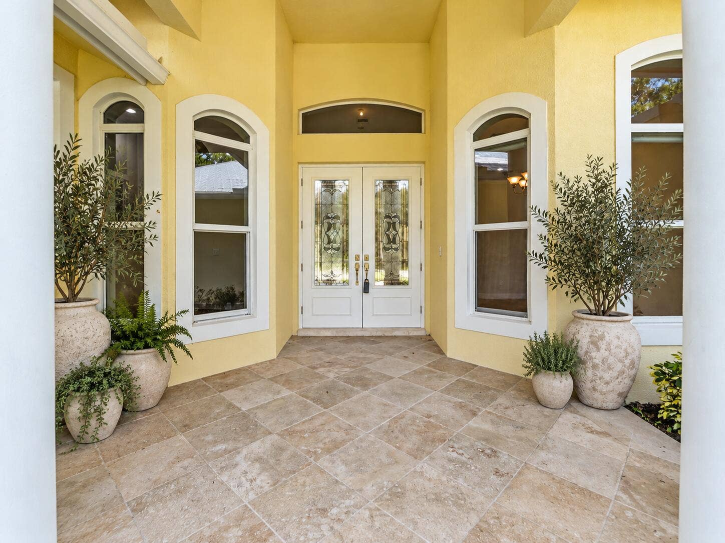 5002 SW Markel Street, Palm City, FL 34990 Mediterranean Entryway with Lush Planter
