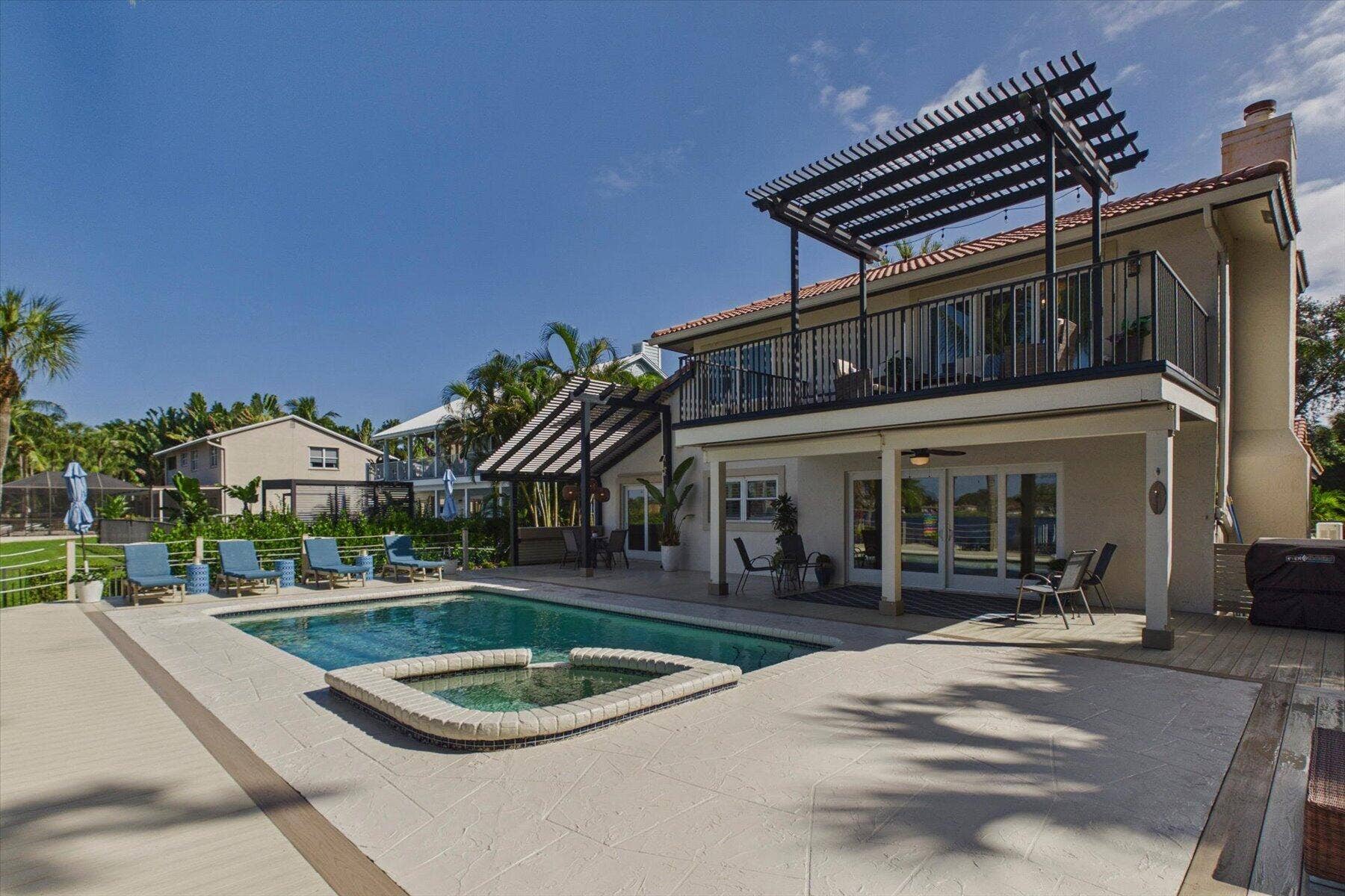 2092 CIRCLE PLACE Drive, Lake Worth, FL 33462 Rear view of Home with Pergolas and Balcony