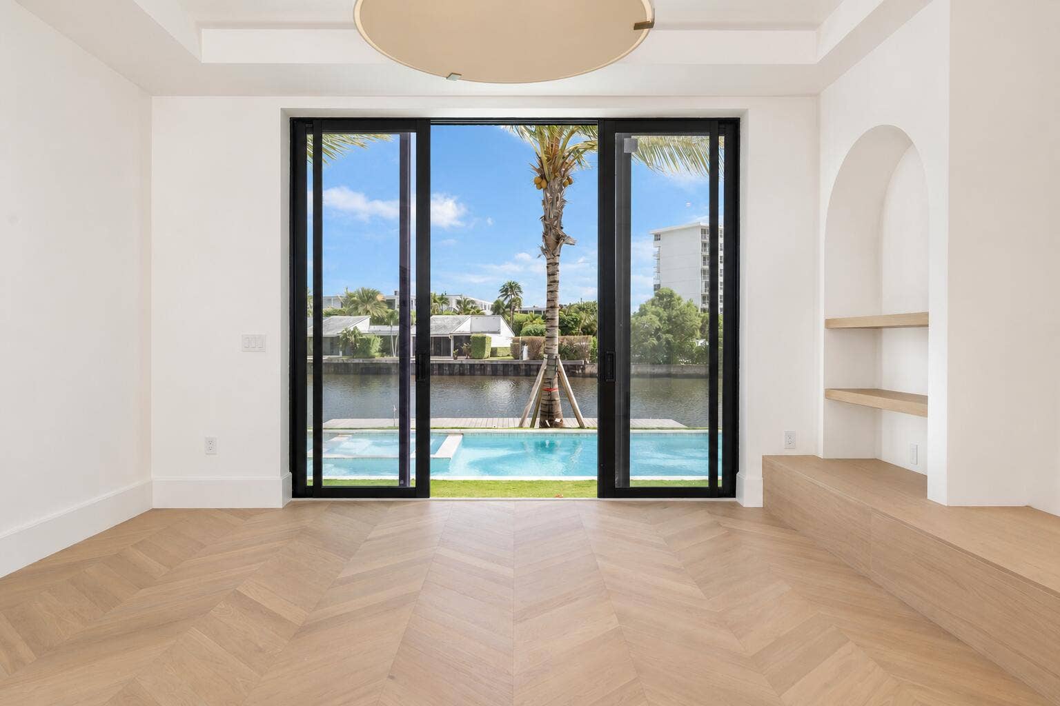 2273 Ibis Isle Road E, Palm Beach, FL 33480 Minimalist Room with Sunny Waterfront Vi