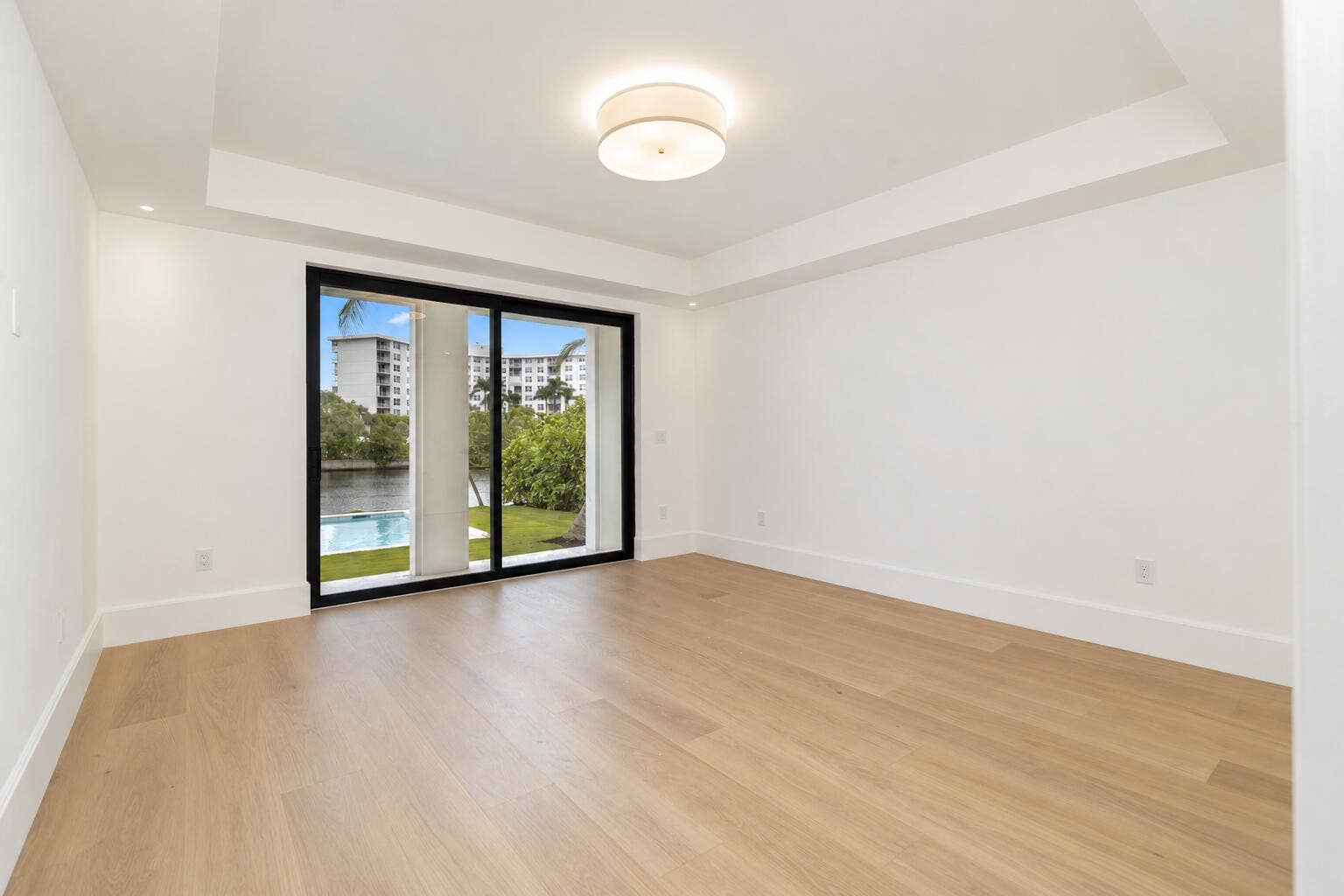2273 Ibis Isle Road E, Palm Beach, FL 33480 Modern Room with Blue-Sky Waterfront Vie