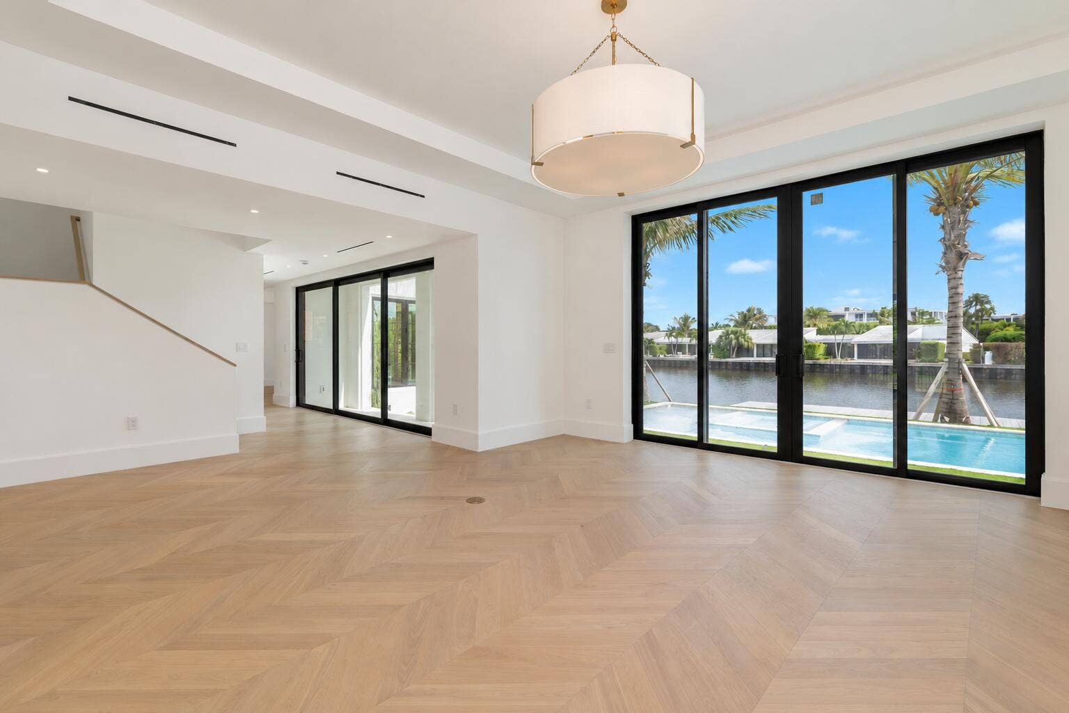 2273 Ibis Isle Road E, Palm Beach, FL 33480 Modern Waterfront Interior with Blue Ski