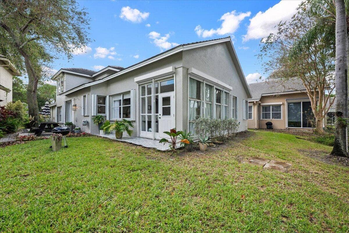 149 HARBOR LAKE Circle, Greenacres, FL 33413 BACK EXTERIOR VIEW
