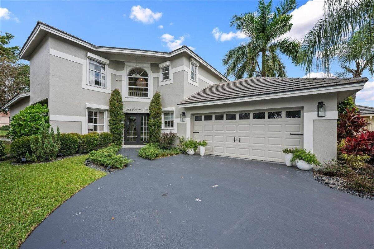 149 HARBOR LAKE Circle, Greenacres, FL 33413 FRONT EXTERIOR