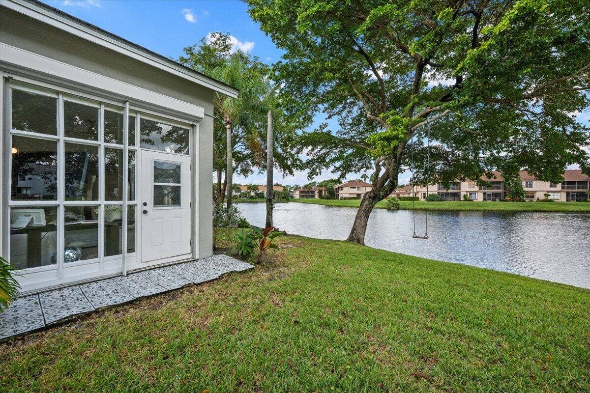 149 HARBOR LAKE Circle, Greenacres, FL 33413 BACK EXTERIOR VIEW