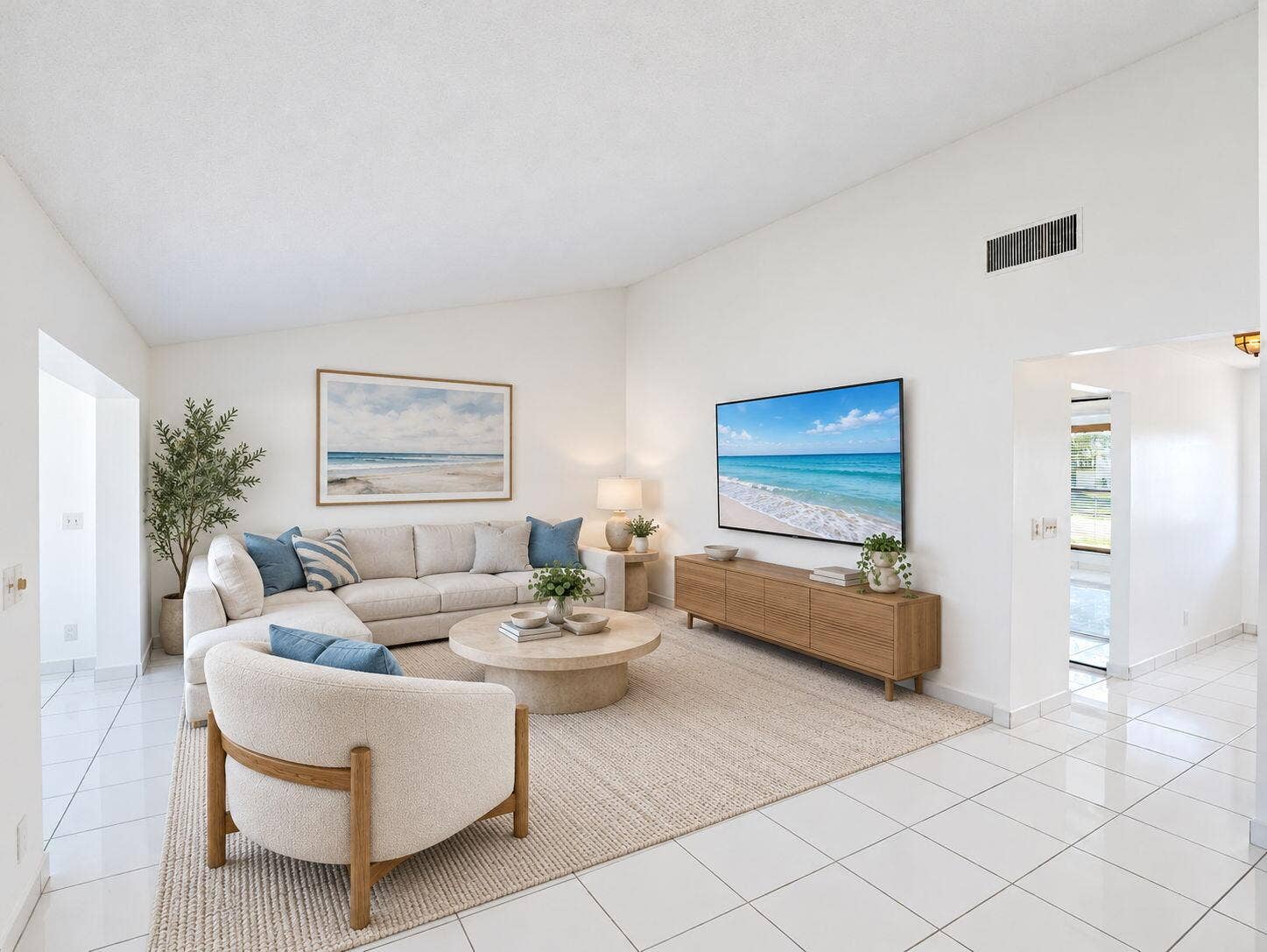 2079 SW 16TH Circle, Deerfield Beach, FL 33442 Living space featuring high vaulted ceilings, expansive white tile flooring, and neutral wall tones
