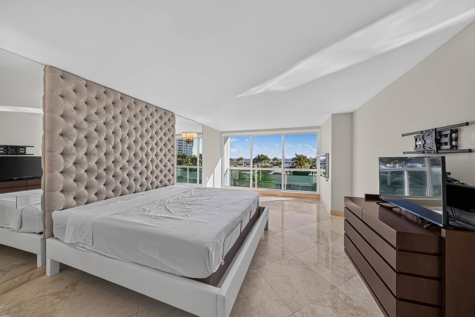 2100 S OCEAN Lane, #205, Fort Lauderdale, FL 33316 Main Residence - Primary Bedroom with electric blackout shade.
