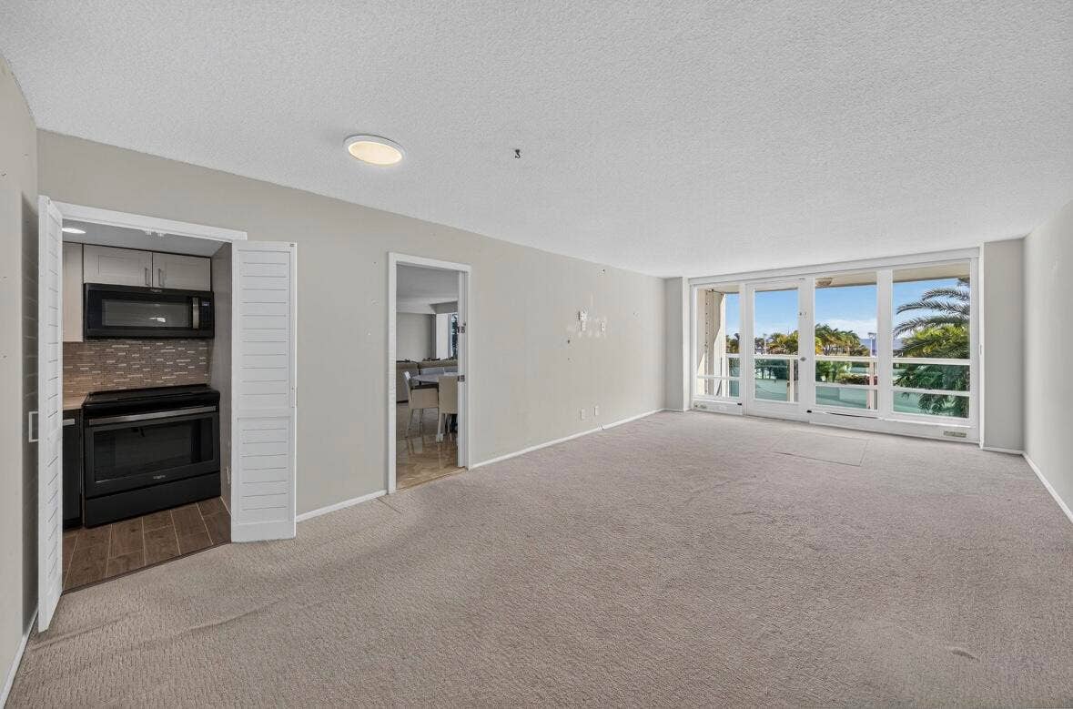 2100 S OCEAN Lane, #205, Fort Lauderdale, FL 33316 Secondary Residence - Living & Dining area including a pocket door for privacy from the Main Residence.