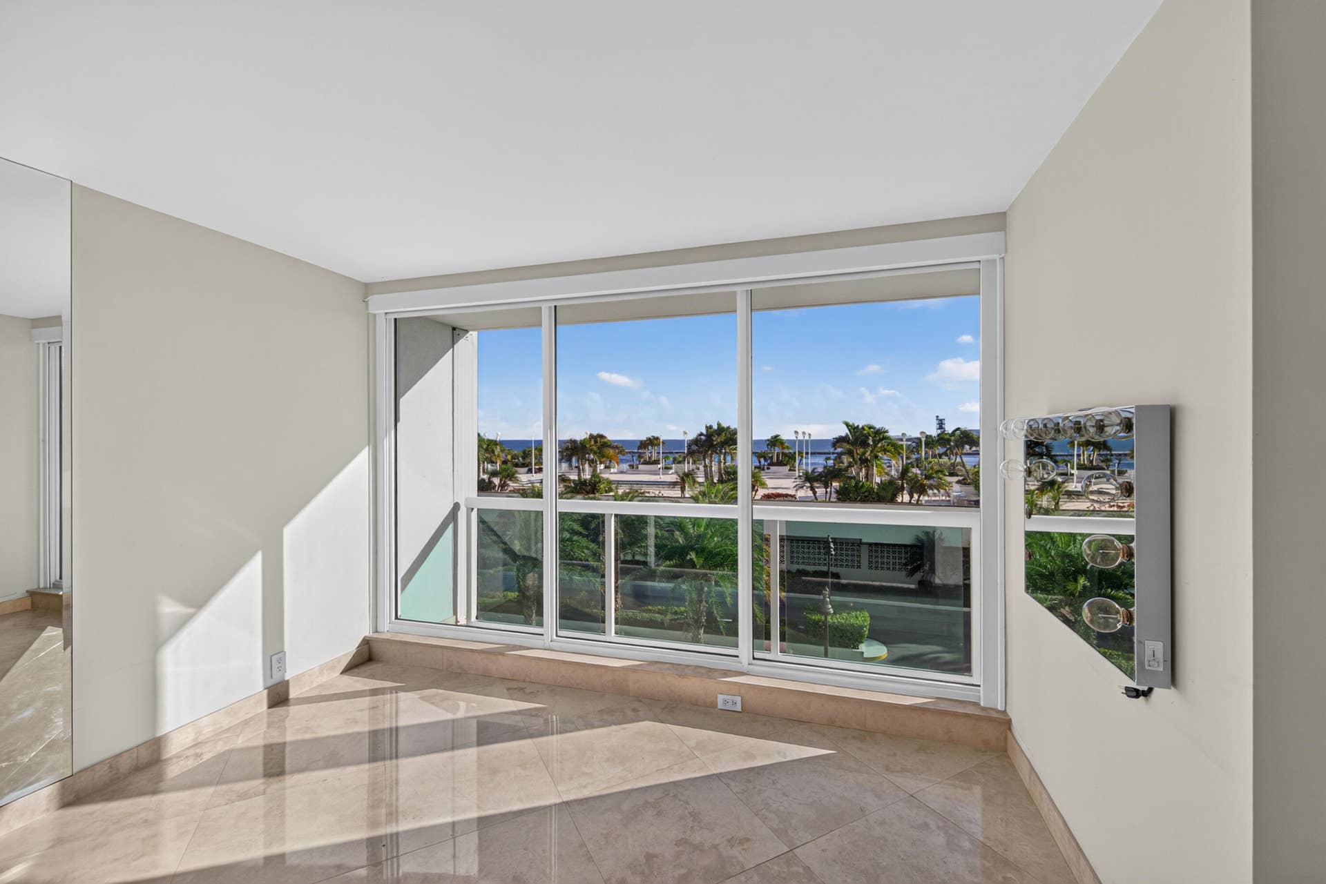 2100 S OCEAN Lane, #205, Fort Lauderdale, FL 33316 Main Residence - Primary Bedroom with electric blackout shade.