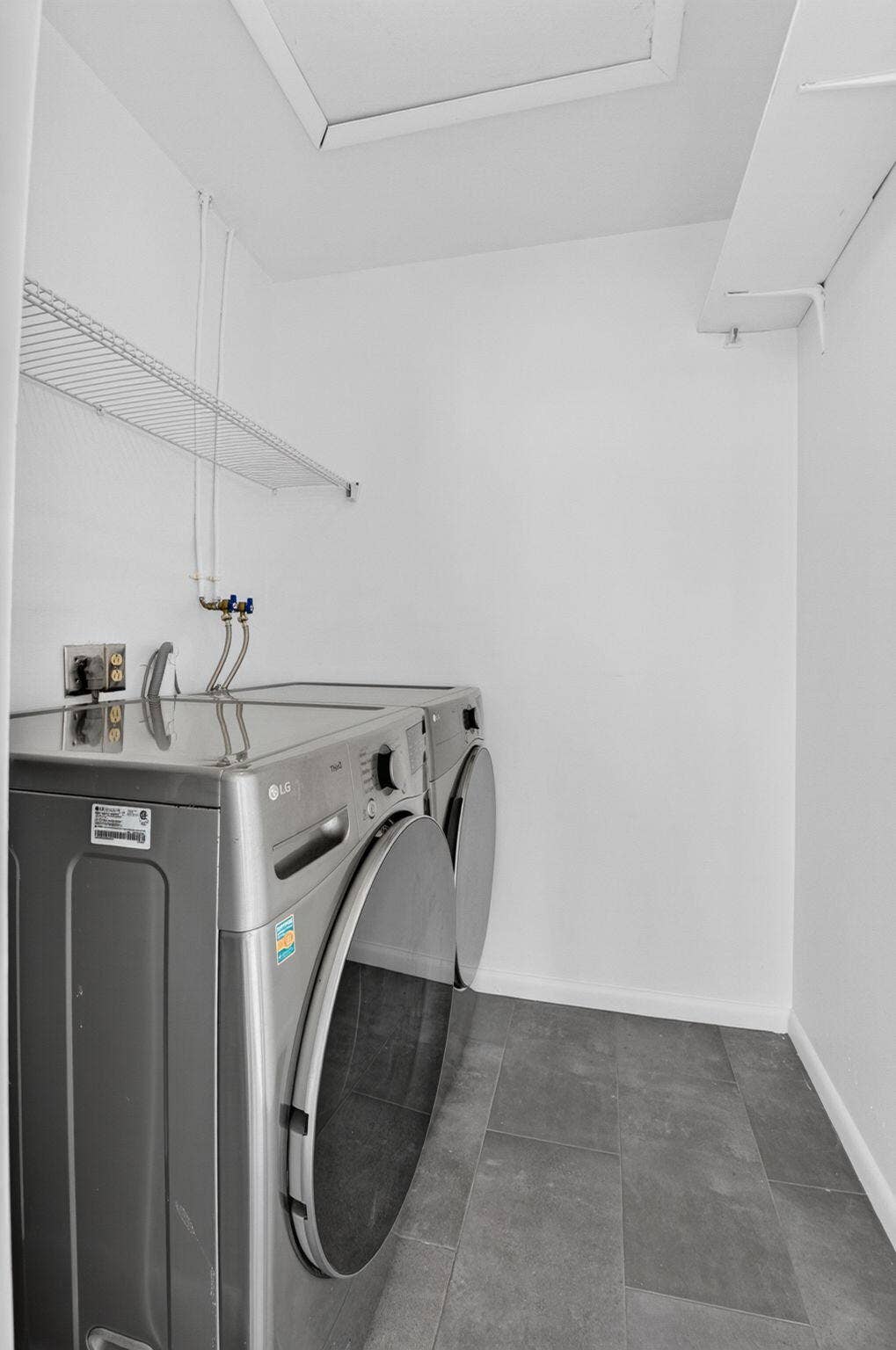 428 Saxony Way, Delray Beach, FL 33446 Enclosed laundry room with newer washer and dryer