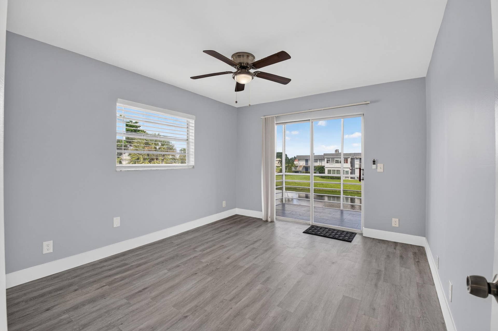 428 Saxony Way, Delray Beach, FL 33446 Bedroom 2 with slider and water views