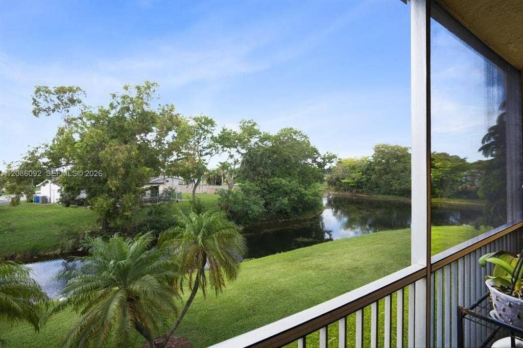 6770 Royal Palm Boulevard, #305L, Margate, FL 33063 canal view