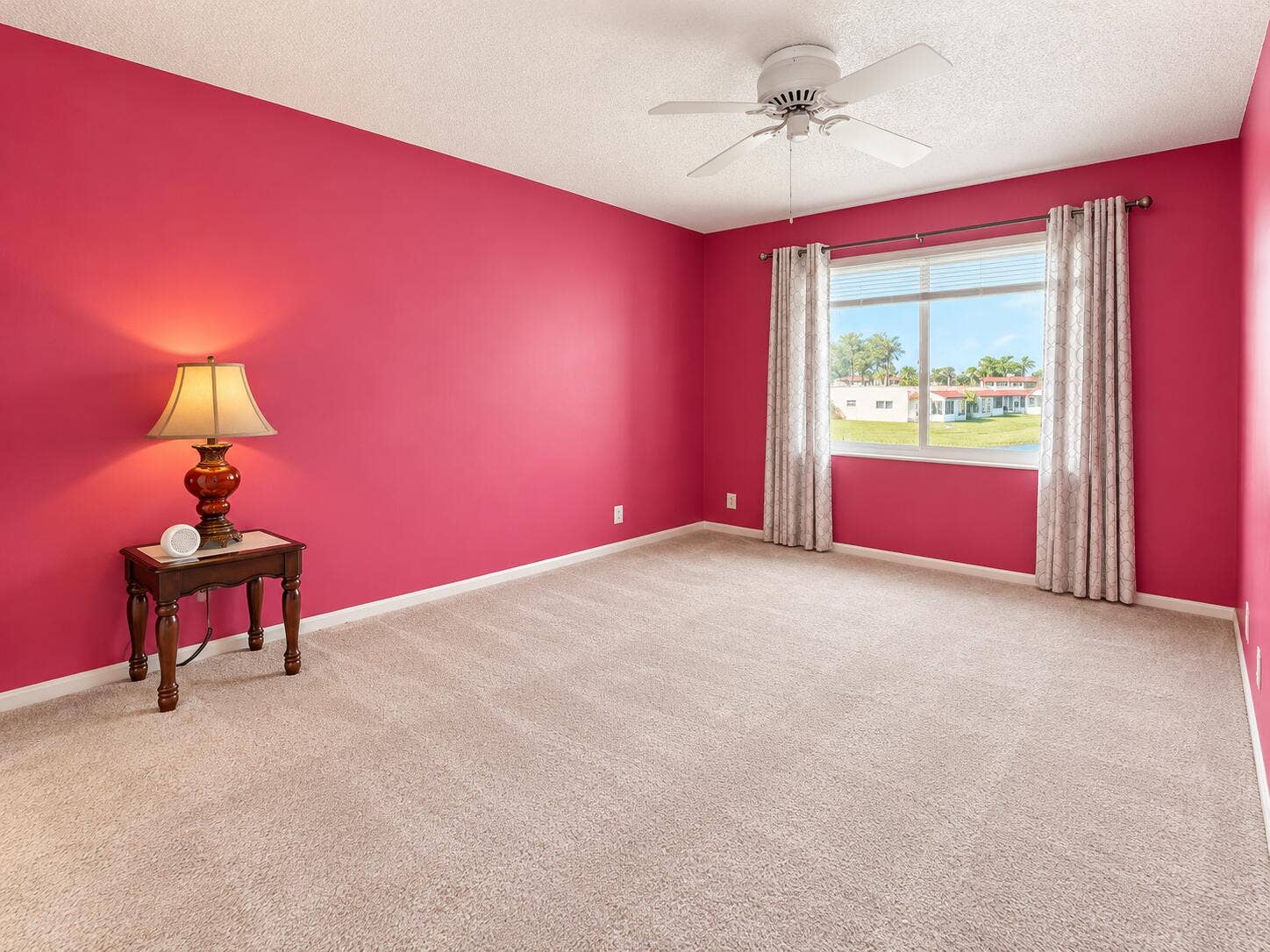Bright Pink Bedroom with Window Views