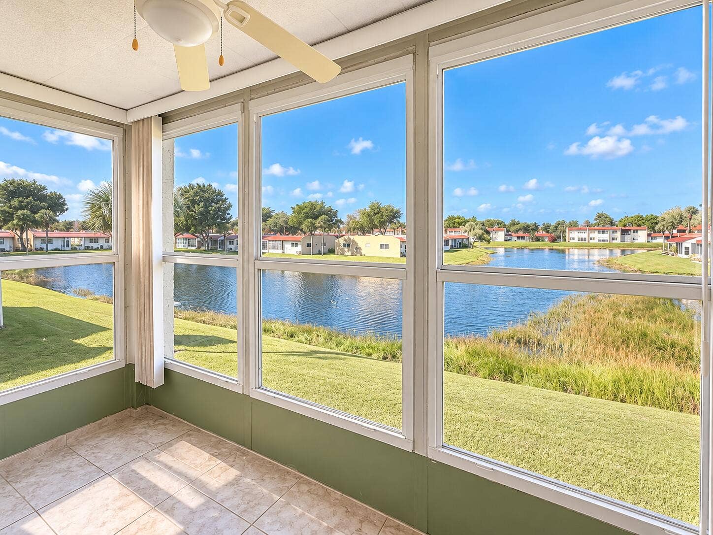 Bright Sunroom Overlooking the Lake
