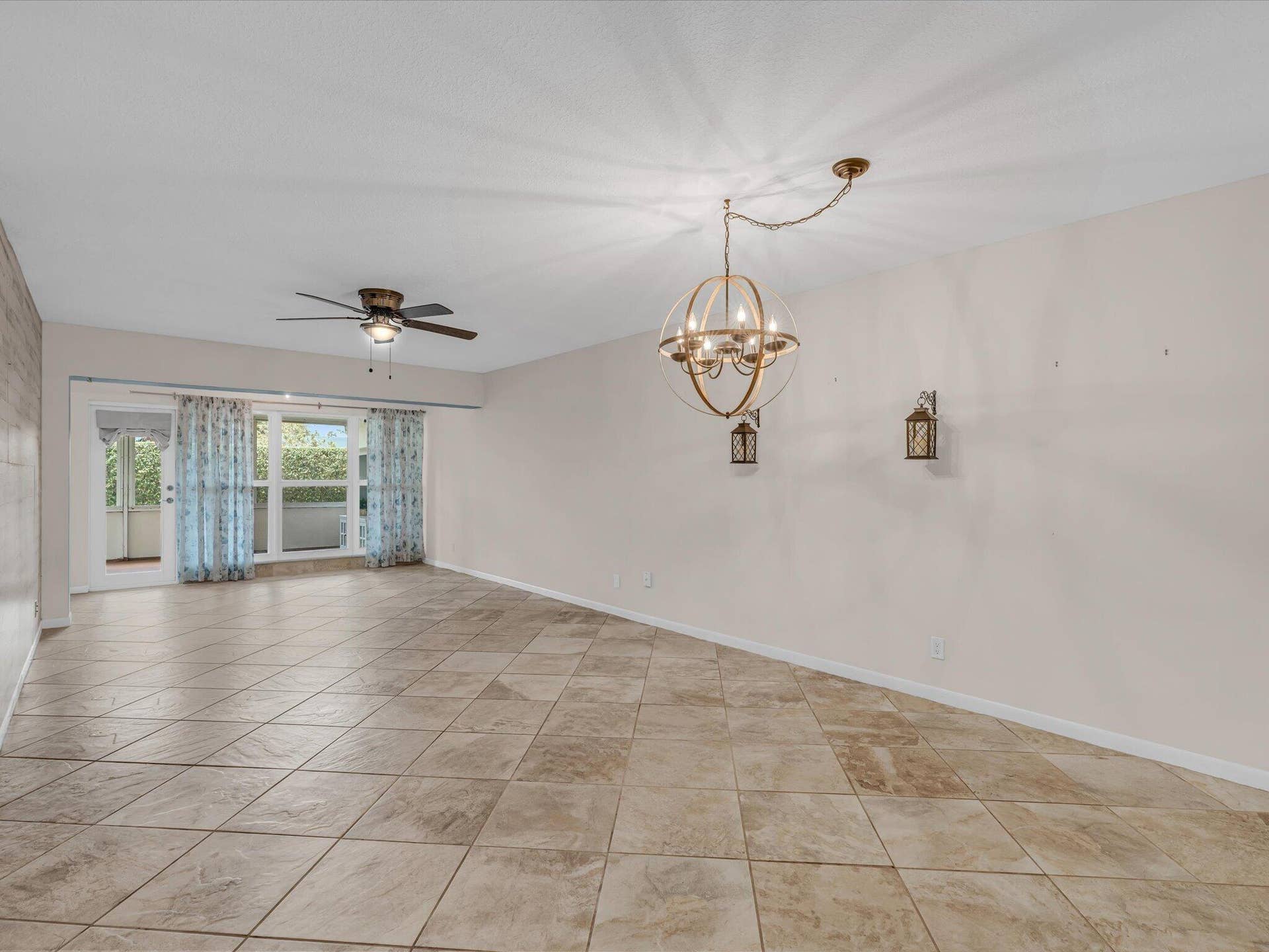 1151 CALAMONDIN Terrace, #103, Delray Beach, FL 33445 Living Dining to Patio