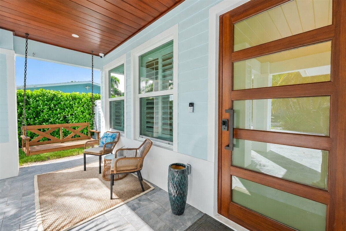 409 KENNEDY Street, Jupiter, FL 33458 63-Coastal Porch Swing Entryway