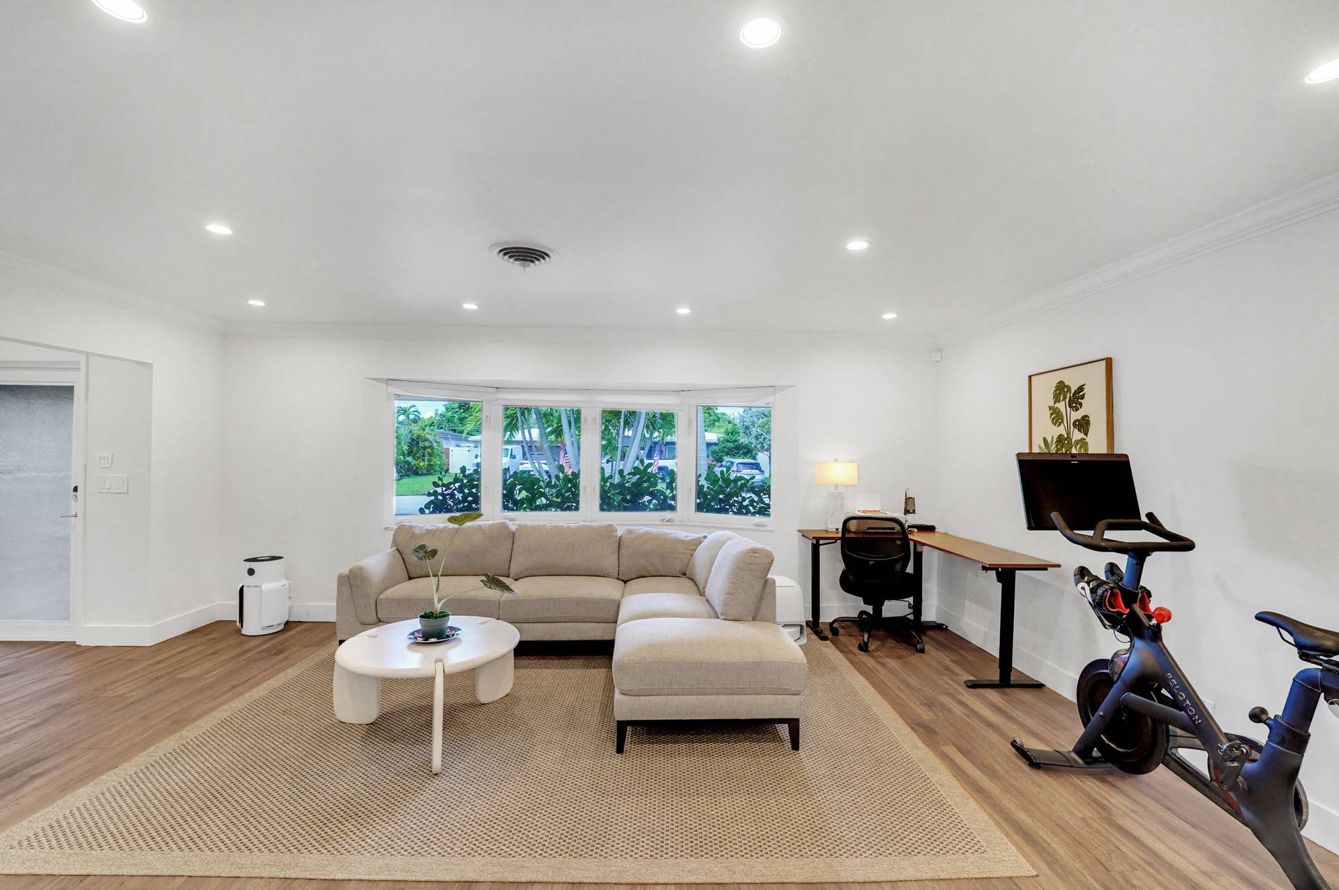 380 NW 35TH Court, Oakland Park, FL 33309 Spacious room featuring recessed lighting, and a large multi-pane bay window