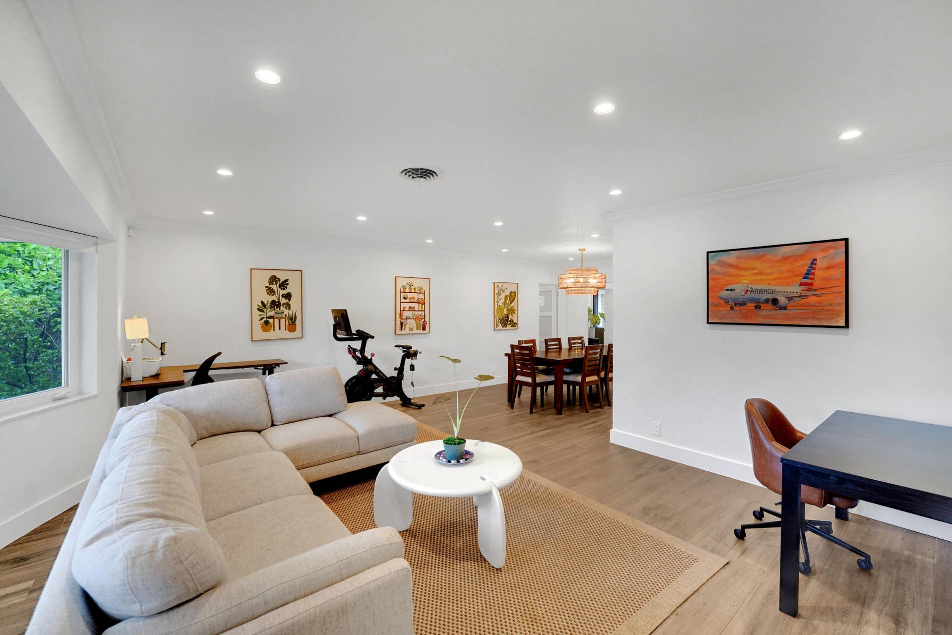 380 NW 35TH Court, Oakland Park, FL 33309 Open floor plan interior featuring recessed lighting, and a multi-light drum chandelier