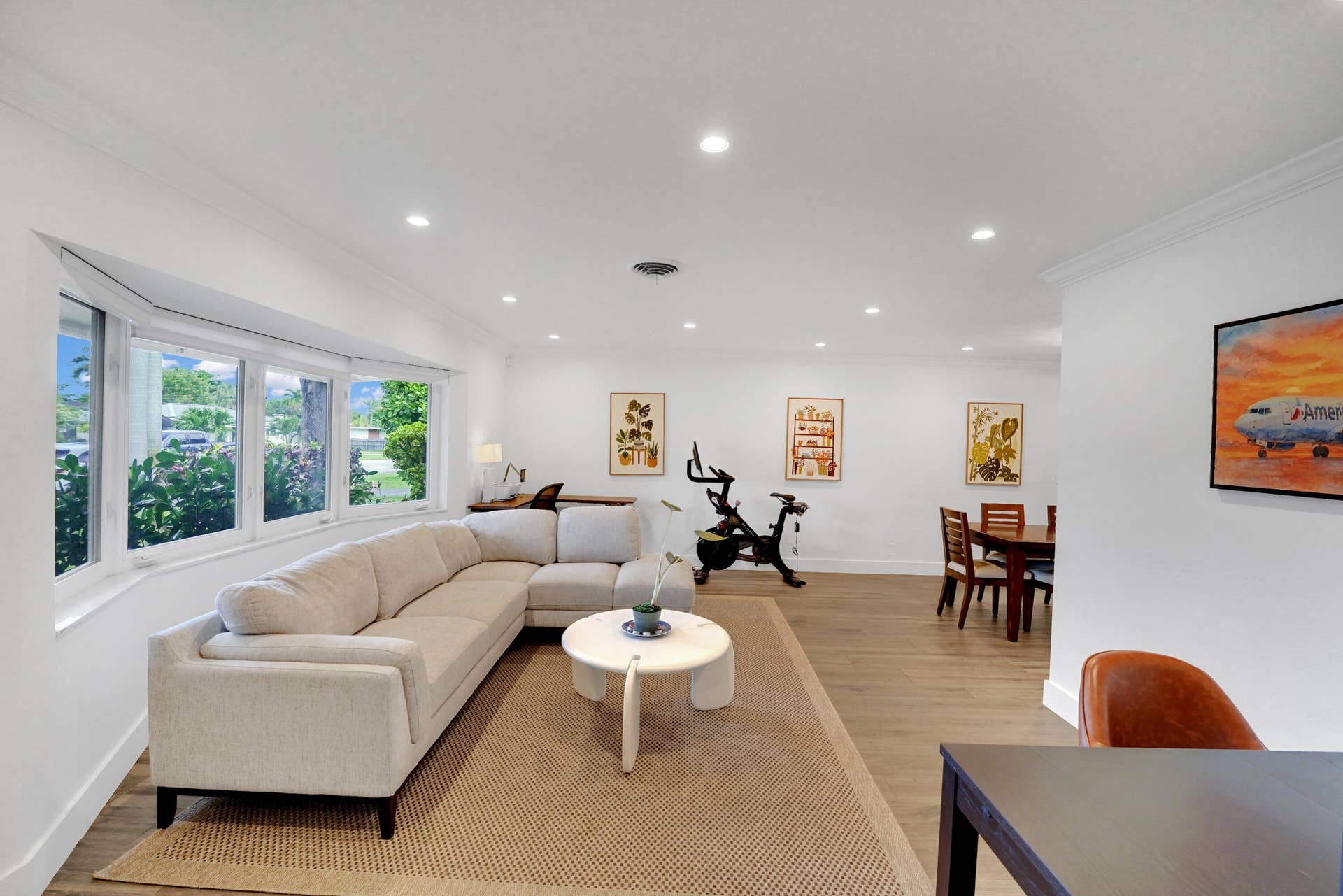 380 NW 35TH Court, Oakland Park, FL 33309 Open-concept living space featuring recessed lighting, and a large bay window